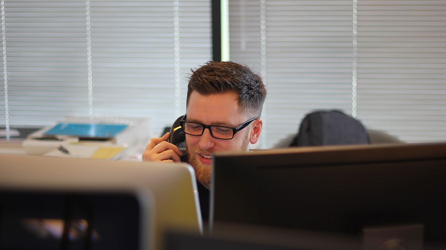 Man on phone in office